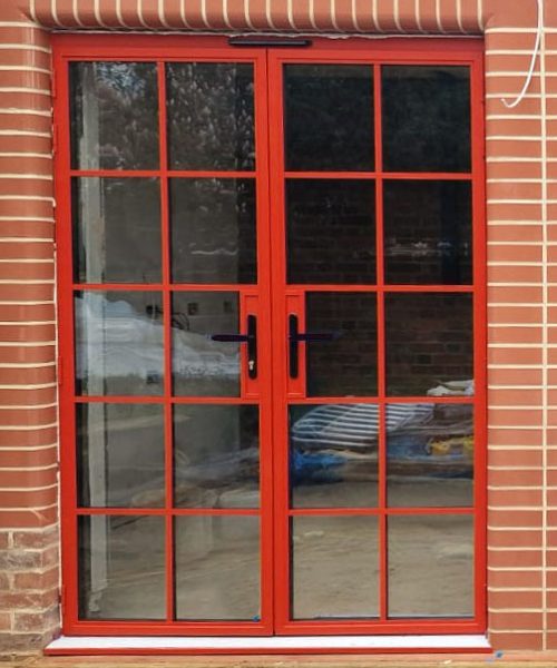 Aluco Exterior French Doors In RAL 3016 Coral Red